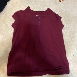 This is a maroon collared shirt.